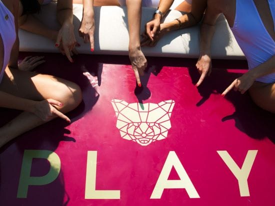 Play's Master logo on a speed boat, promoting the launch of the re branded club in Hong Kong