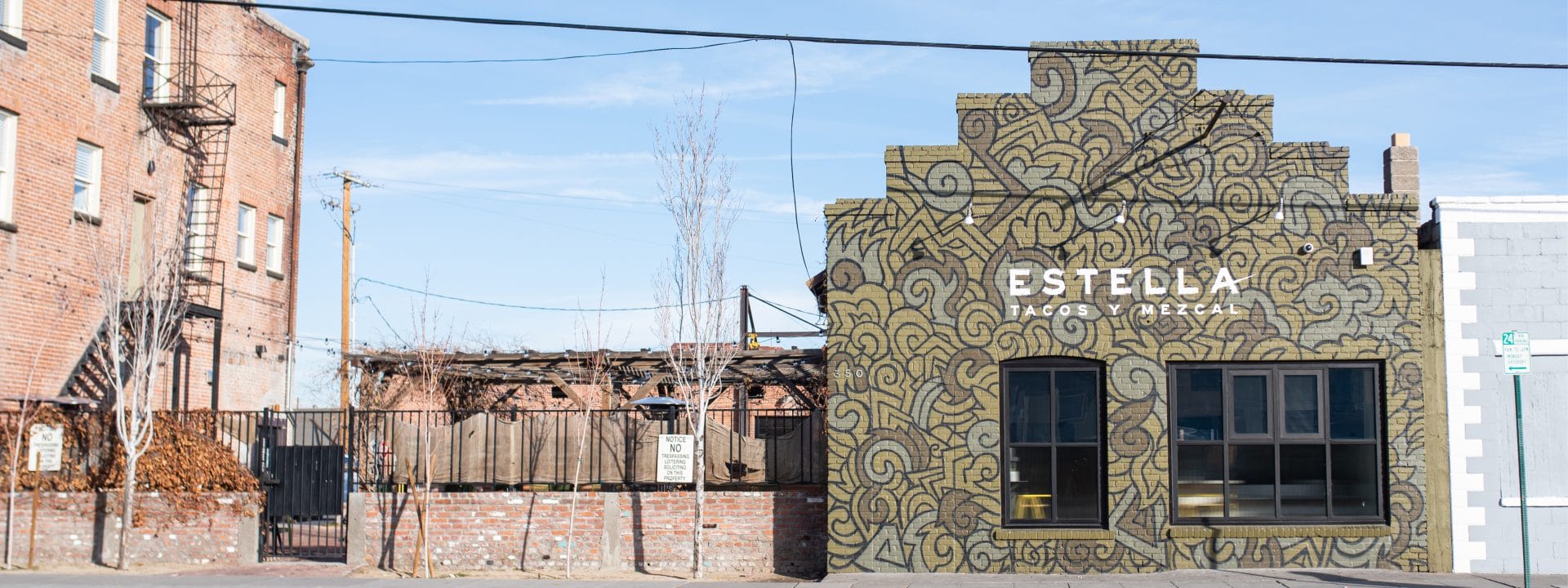 Rushton Smith - Custom Brand Design - Estella Tacos Y Mezcal Restaurant - Brand Mural Street View of Restaurant